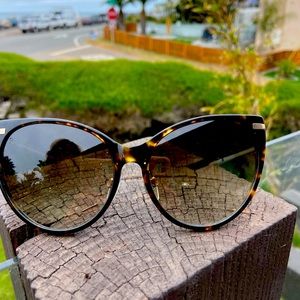 RAEN women’s tortoise with gold cat eye brindle sunglasses. Never worn.